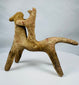 Greek terracotta horse and rider figurine with abstract geometric styling characteristic of Boeotian workshops.