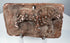 Ancient Indian terracotta relief showing a spotted feline, possibly a leopard, facing right across a rectangular plaque.