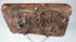 Mould-made Indian terracotta animal plaque with raised feline figure and salmon-pink ceramic fabric.