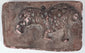 Early Indian moulded terracotta plaque featuring a large cat with curling tail and worn spotted decoration.