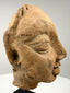 Gupta period terracotta head fragment profile with heavy-lidded eyes on black stand