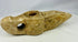 Historic Islamic lighting artifact carved from a single stone block