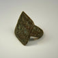 Historic bronze ring with legible twin bird engraving, square bezel, and centuries-old green patina