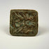 Mediterranean bronze finger ring featuring two engraved birds on a square bezel
