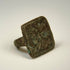 Ancient cast bronze ring with twin bird engraving and naturally developed green patina
