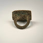 Ancient Middle Eastern or Mediterranean bronze ring with square engraved bezel and weathered patina