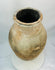 Eastern Mediterranean Byzantine ceramic storage jar with olive-shaped body and aged finish