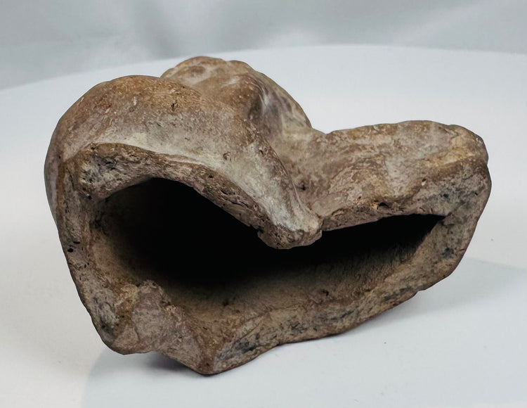 Authentic Hellenistic or Roman terracotta figural fragment from a long-established private antiquities collection.