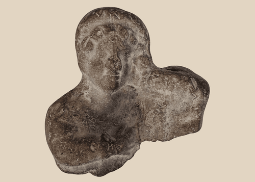Ancient Classical Mediterranean terracotta figural bust fragment dating from the Hellenistic to Roman period.