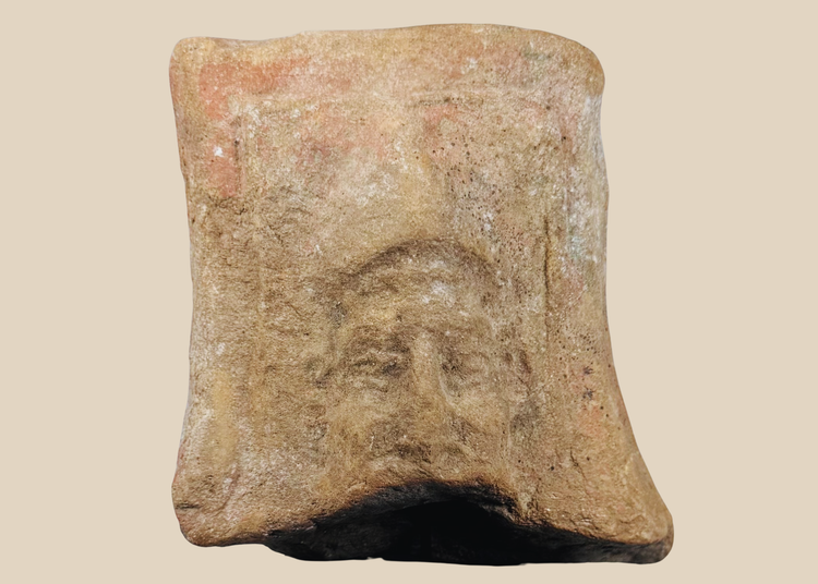 Ancient Hellenistic-Roman terracotta relief fragment depicting a mature male face