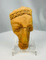 Ancient Mediterranean terracotta dramatic mask fragment with expressive facial modeling