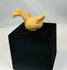 Small Pre-Columbian clay bird sculpture from West Mexico showing incised eye and curved beak detail