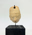 West Mexican terracotta pendant head with angular headdress