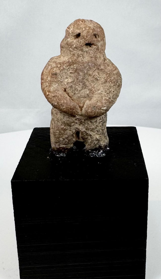 Possible Mezcala stone figure from Western Mexico mounted on a display stand