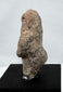 Pre-Columbian ritual stone effigy displaying substantial age patina and mineral deposits