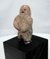 Ancient West Mexican carved stone figure with recessed eyes and small open mouth
