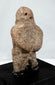 Small ancient Mesoamerican stone effigy with simplified facial features and custom stand