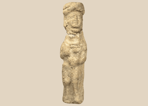 Ancient Mesopotamian terracotta female figurine with folded arms