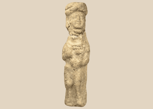 Ancient Mesopotamian terracotta female figurine with folded arms