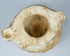 Hand-carved white stone bowl with mineral encrustation and patina
