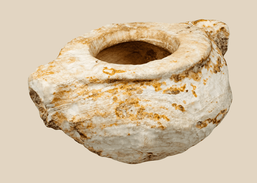 Ancient Middle Eastern carved white stone vessel with opposing lugs