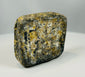 Mesopotamian style stone artifact with worn grid pattern carving