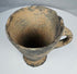 Interior view of wheel-made conical cup with visible turning marks