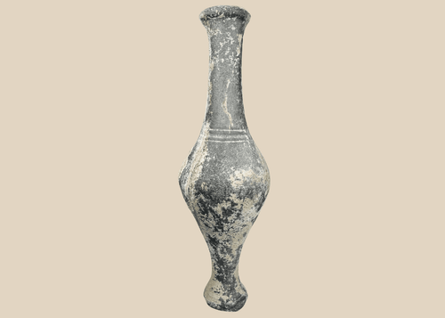 Ancient Iranian grayware spindle bottle with long neck and pedestal foot