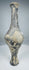 Ancient grayware bottle with globular body and narrow elongated profile