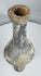 Ancient Near Eastern bottle with narrow opening for controlled dispensing