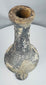 Ancient Near Eastern bottle with narrow opening for controlled dispensing