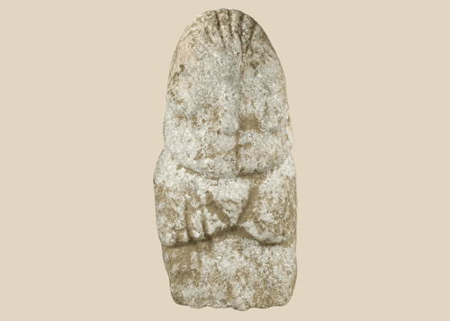 Ancient Near Eastern limestone idol with abstract anthropomorphic form and patina