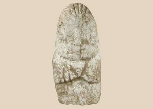 Ancient Near Eastern limestone idol with abstract anthropomorphic form and patina