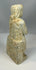 Ancient stone votive figure with hands clasped in prayer posture