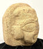 Three-quarter angle of terracotta head showcasing voluminous hair volume and side contour
