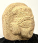 Three-quarter angle of terracotta head showcasing voluminous hair volume and side contour