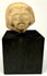 Frontal view of Ancient Near Eastern terracotta head fragment with defined beard and arched brows