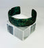Detail view of incised decoration on ancient Persian bronze cuff bracelet