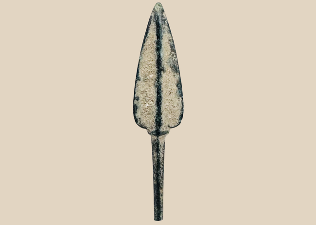 Ancient Western Asiatic bronze projectile point with leaf-shaped blade and long tang