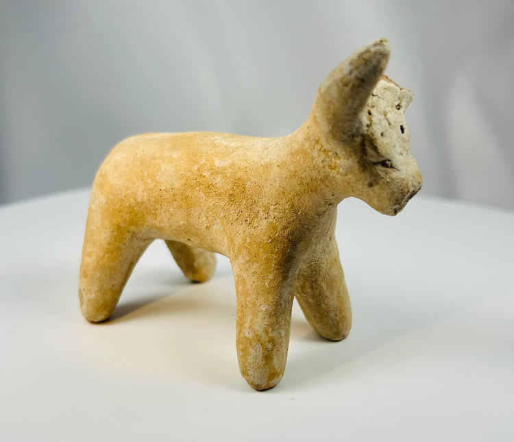 Ancient Persian Amlash terracotta bull with pierced circular eyes.