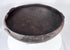 Pre-Columbian earthenware vessel featuring a hemispherical form and fire-clouded patina