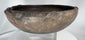 Ancient terracotta vessel displaying raised rim nodes and authentic age-related weathering