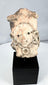 Ancient Mexican terracotta sculpture fragment with rounded face and large neck ornaments