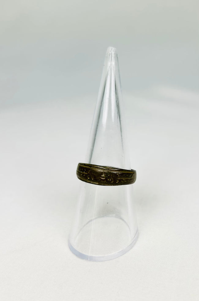 Ancient Roman ring worn as symbol of status or identity with decorative engraving