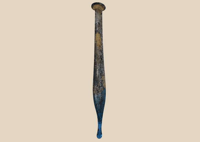 Ancient Roman blue glass candlestick unguentarium with elongated fusiform body, circa 1st–3rd Century AD