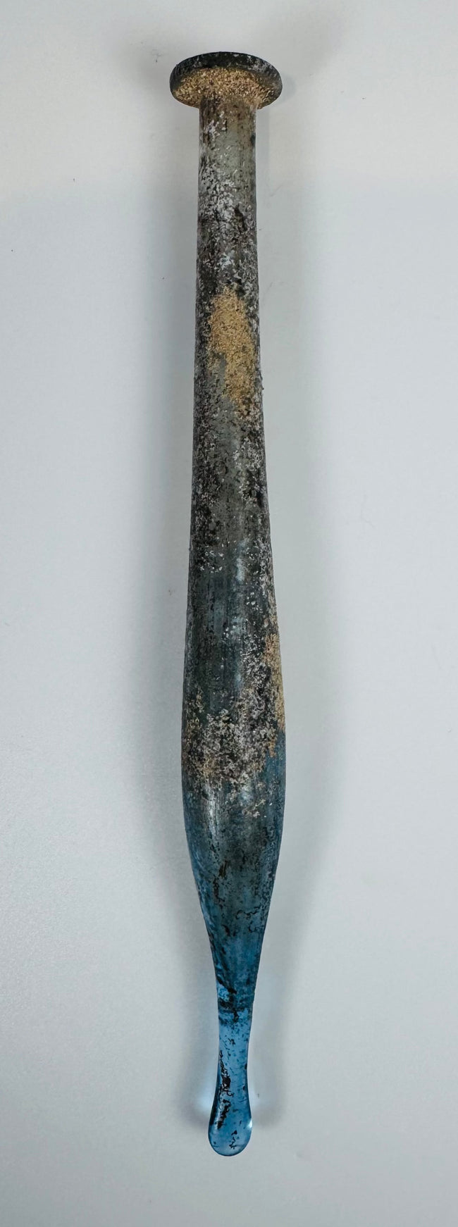 Roman Imperial period glass unguentarium with narrow tubular neck and flared rim