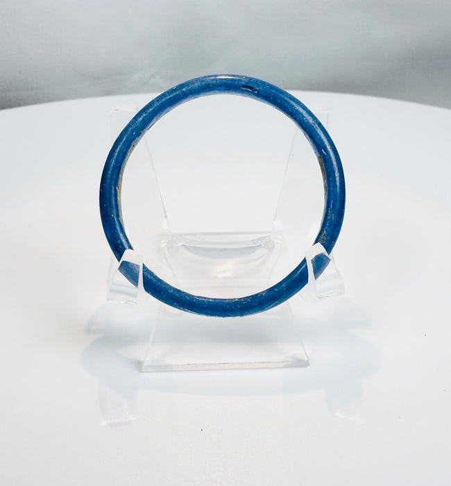 Roman Imperial blue glass bracelet displaying attractive archaeological wear and ancient craftsmanship.