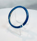 Authentic Roman blue glass bracelet featuring a complete circular form and smooth profile.