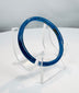Ancient Roman personal adornment made from cobalt-blue glass, dating to the 1st–4th century AD.