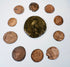 Ancient Roman Imperial coin collection with one large bronze coin and nine smaller Late Roman issues displaying portraits and reverse designs.